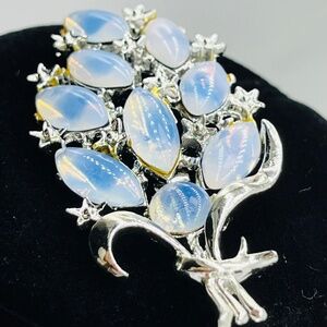 Vintage Faux Opal and Stars, Blue and Silver Tone brooch.
